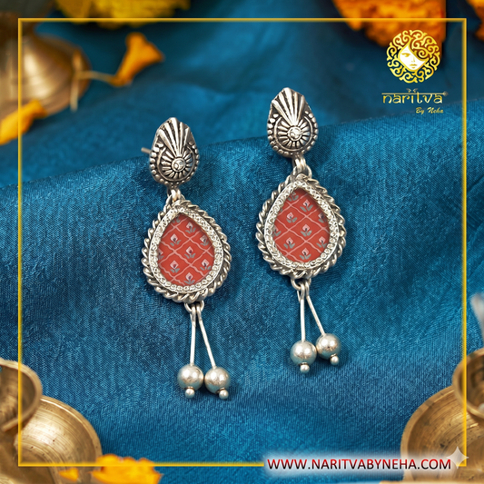 Red painted earrings